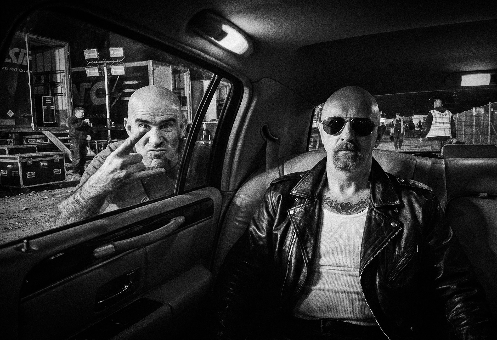 Scott Ian and Rob Halford in a limo in Miami, August 1994